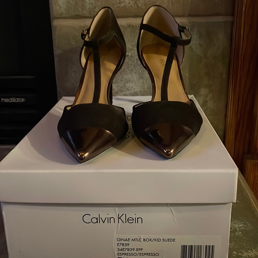 Calvin Klein Brown Metallic and leather strap shoe.